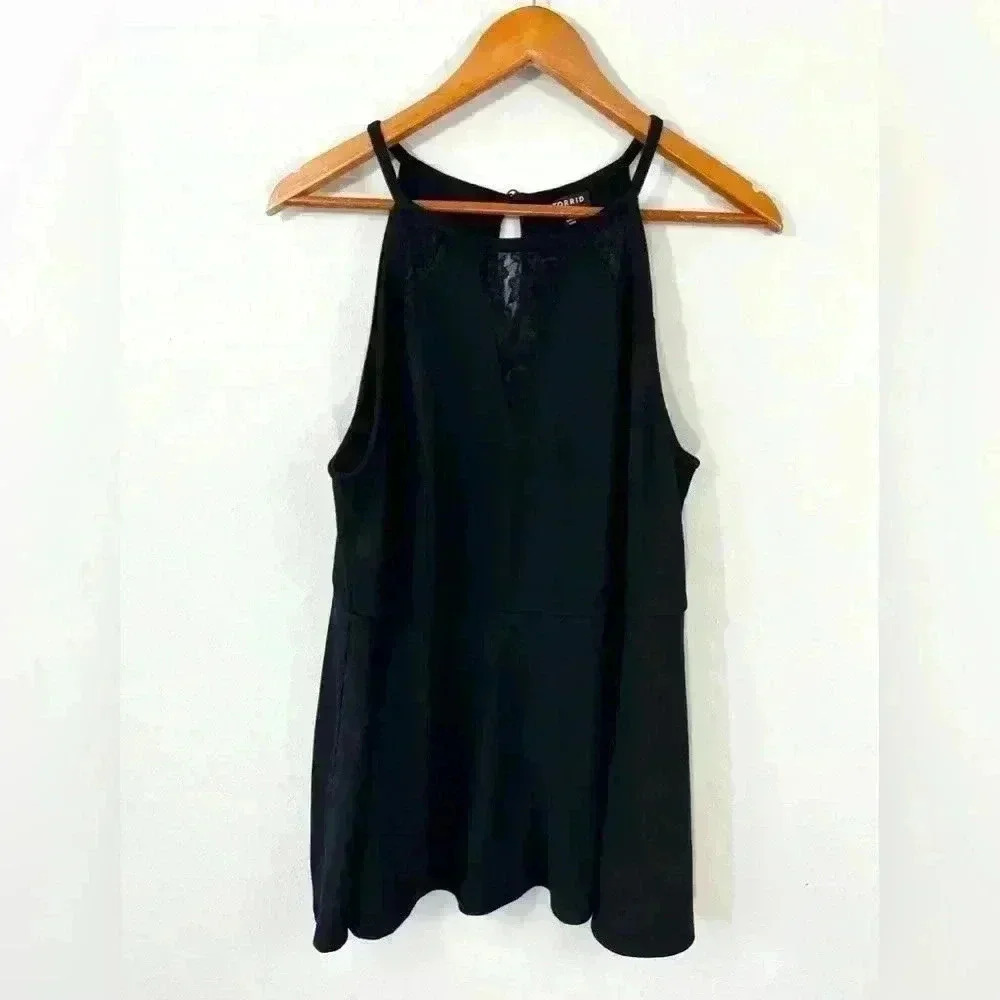 Torrid black peplum top with lace detail